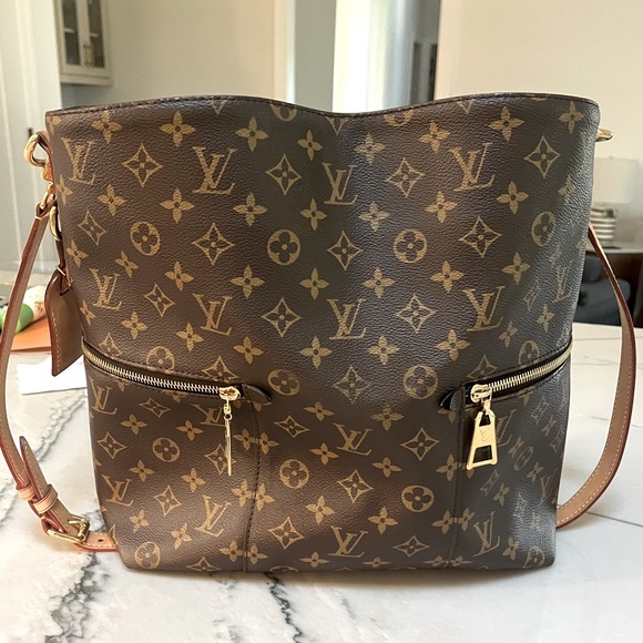 Louis Vuitton Handbags - EUC Louis Vuitton Melie Bag